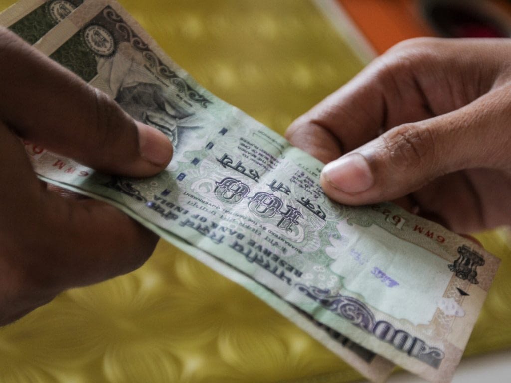 The Indian rupee has fallen nearly 16 percent against the dollar since May. The drop comes amid a slowdown in the country's economy. India's troubles are mirrored in other emerging economies that drove global growth for the past decade.